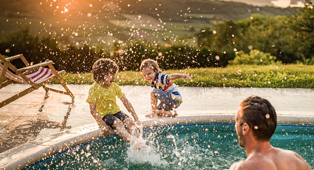 Kids playing in heated pool water