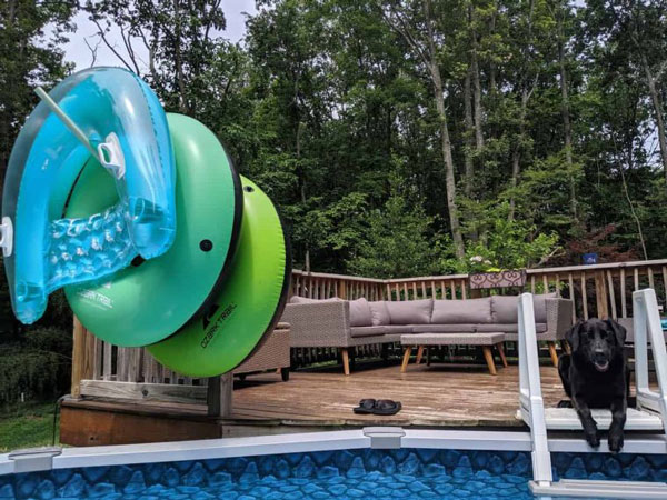 Hanging pool floats on PVC storage rack