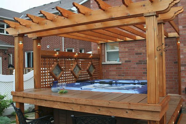 Jacuzzi spa with wood pergola and lattice