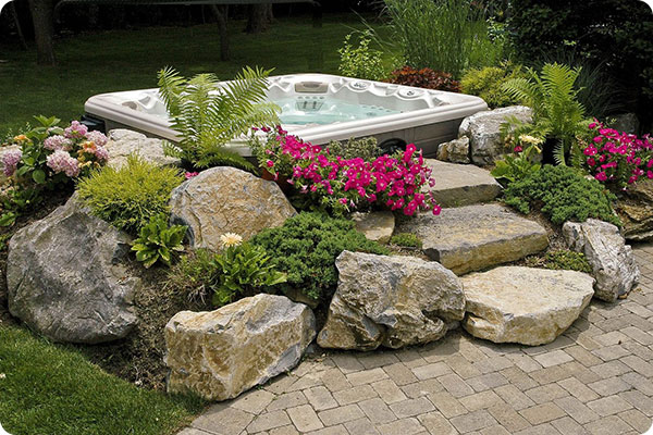 add rocks around your hot tub