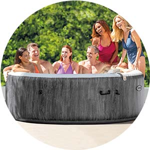 people enjoying an intex hot tub