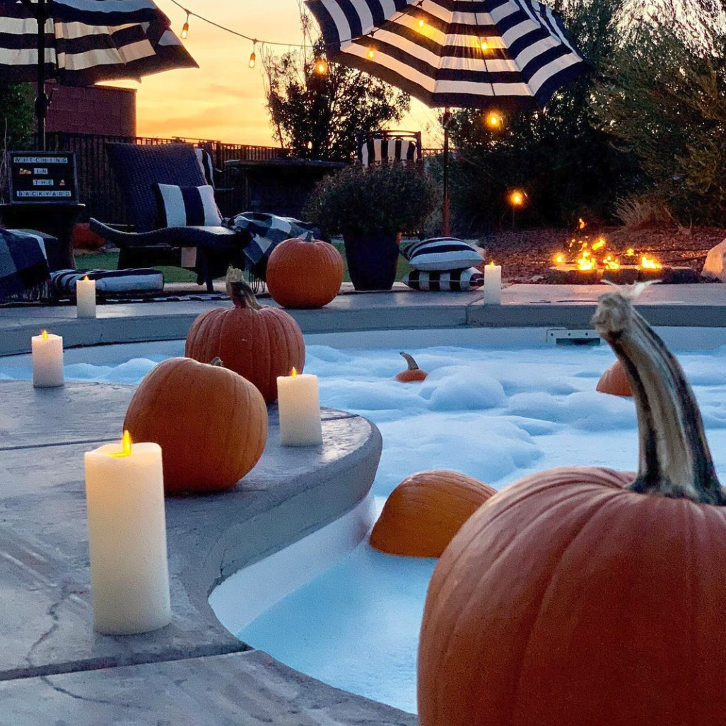 pumpkins and fun suds in a pool