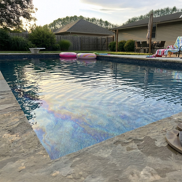 pool with oily film on the surface